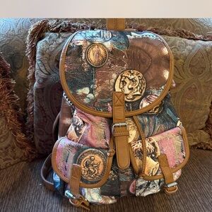 Multi-coloured fabric backpack with a touch of whimsy #fairycore #y2kfashion